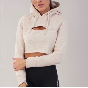 Cream colored Gymshark cropped hoodie